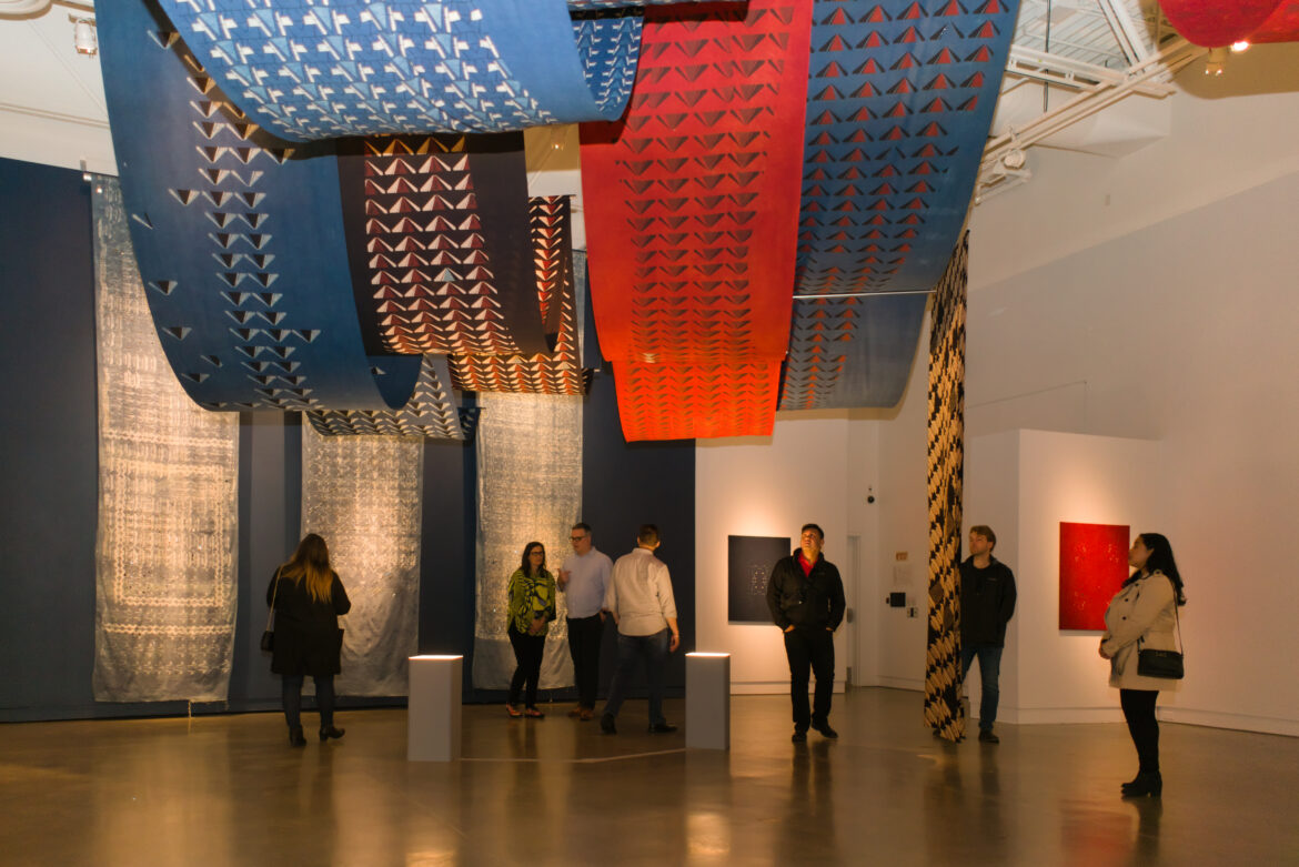 Visitors engaging in art during Fall Opening. Photo by Daniel N. No Surface is Neutral