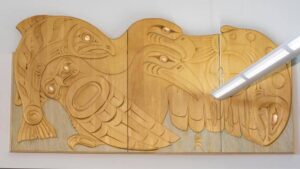 Photo credit: surrey.ca | Coast Salish carving | Artist: Xwalacktun (Rick Harry)